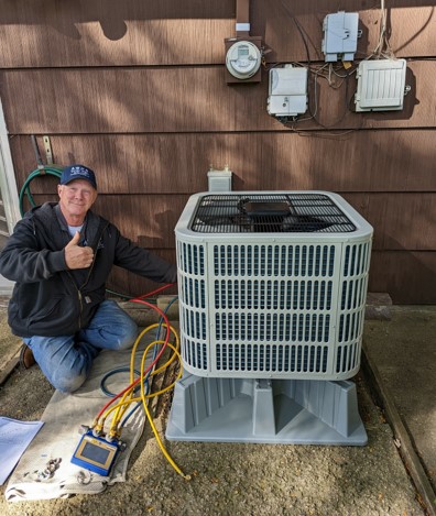 Tech installing an air conditioner